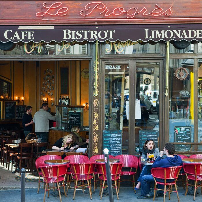 BKK7RF People having drinks on terrace Le Progres in the Montmartre, Paris